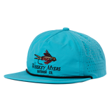 Bright teal baseball cap with a fishing lure logo and ’Whiskey Myers Outdoor Co.’ text.