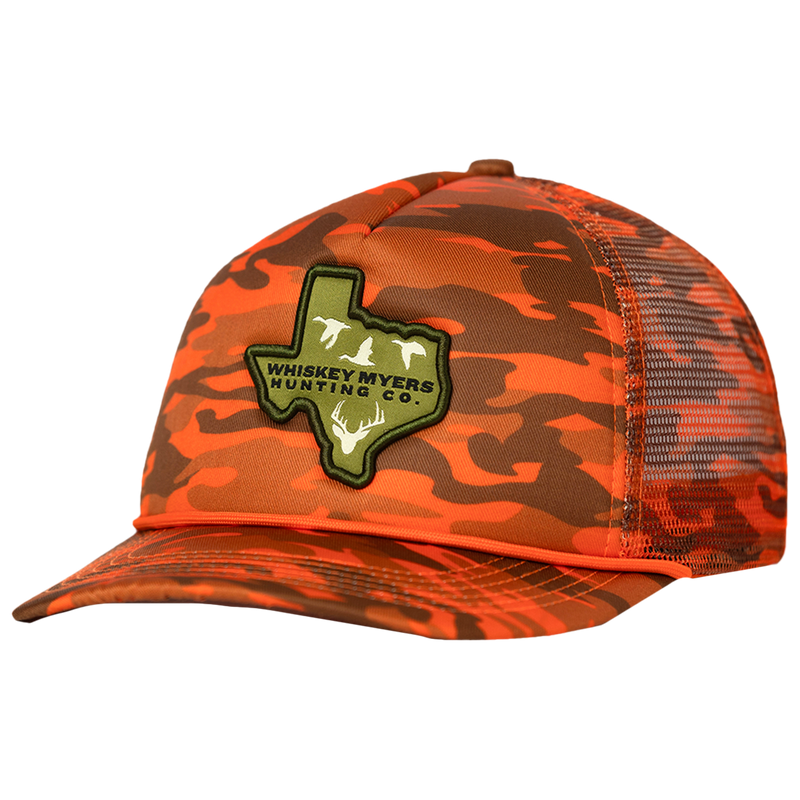 Orange camouflage trucker hat with a green Texas-shaped patch.