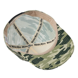 Camouflage-patterned baseball cap with mesh panels and ’Whiskey Myers’ branding.