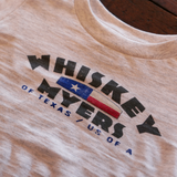 T-shirt with ’Whiskey Myers of Texas, USA’ printed on it, featuring a stylized American flag design.