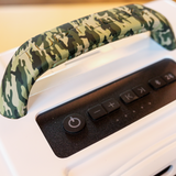 Cooler or portable refrigerator with a camouflage-patterned handle and control panel.