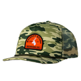 Camouflage-patterned baseball cap with an orange patch featuring a deer logo.