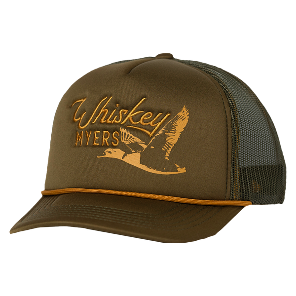 Trucker-style cap with ’Whiskey Myers’ and a flying duck logo embroidered on the front.