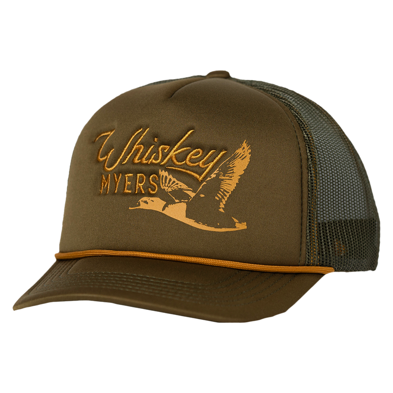 Trucker-style cap with ’Whiskey Myers’ and a flying duck logo embroidered on the front.