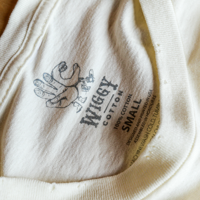 White cotton t-shirt with a printed logo and text.