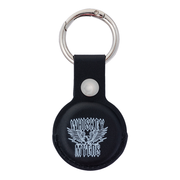 Black leather keychain with a metal ring and a ’Whiskey Myers’ logo featuring wings.