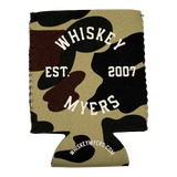 Camouflage-patterned drink koozie with ’Whiskey Myers Est. 2007’’ text.